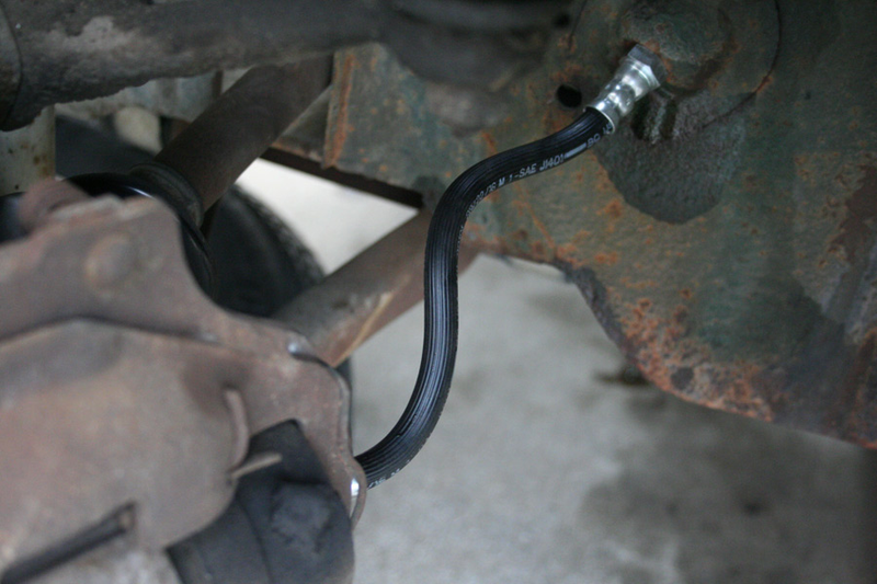 A new brake hose replaces one which had dried out and cracked with age.